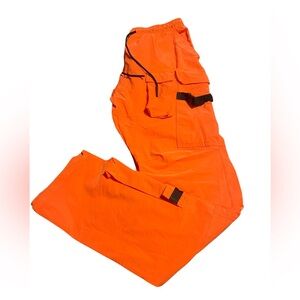 Product: Orange lightweight breathable nylon swisher pants